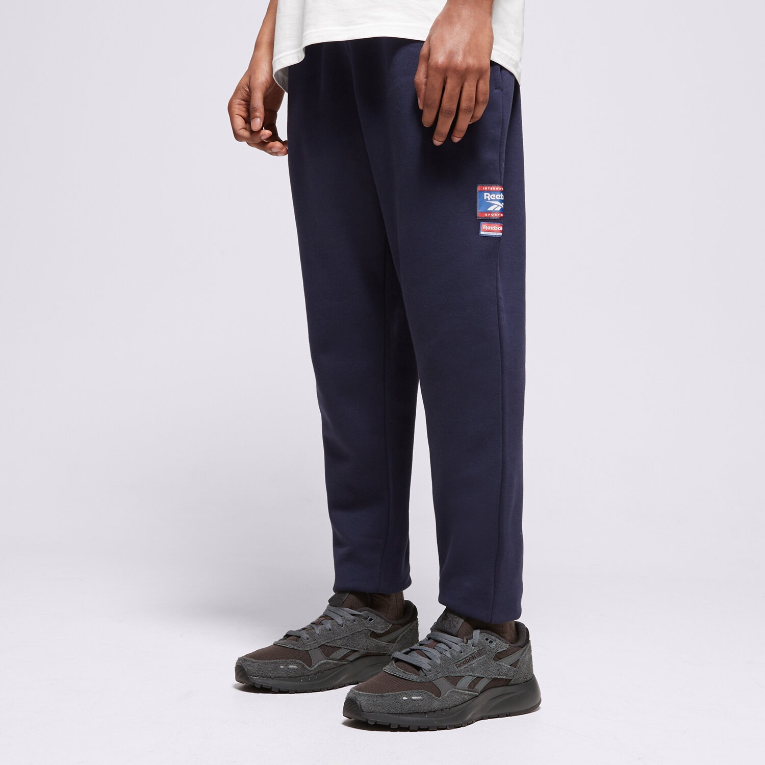 Herren Hosen REEBOK HOSE RI BADGE 100205446 Dunkelblau