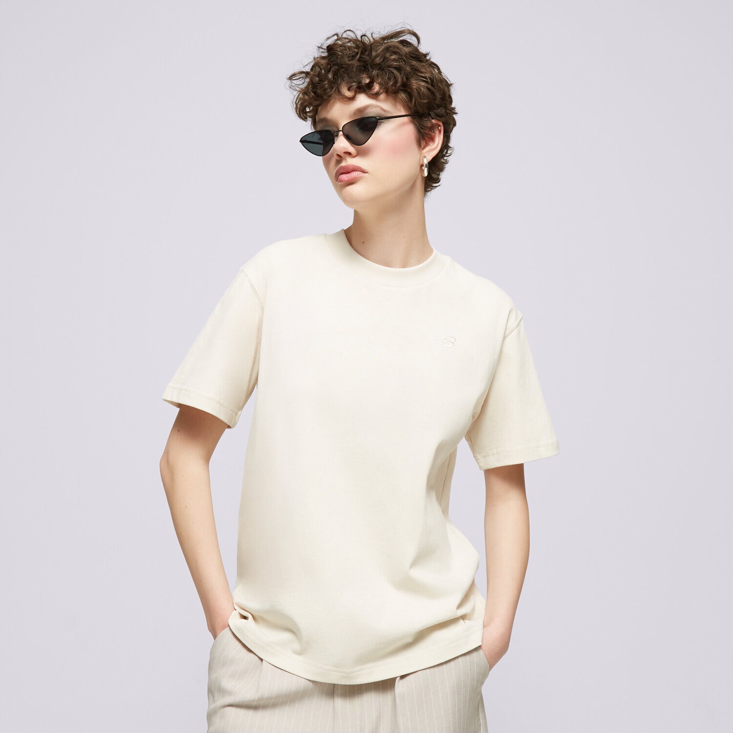Damen T-Shirt NEW BALANCE T-SHIRT ATHLETICS JERSEY WT41501LIN Beige