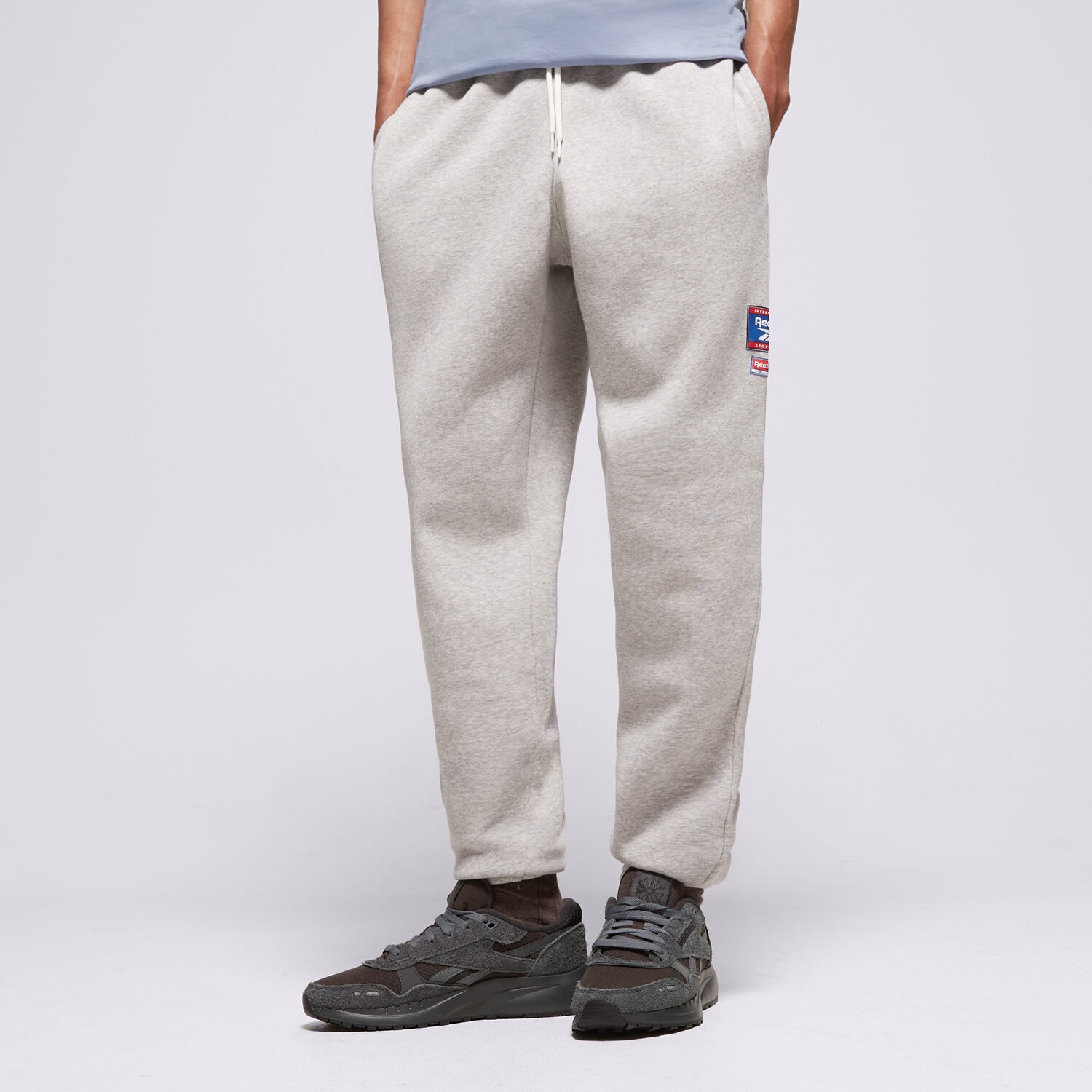 Herren Hosen REEBOK HOSE RI BADGE 100205445 Grau
