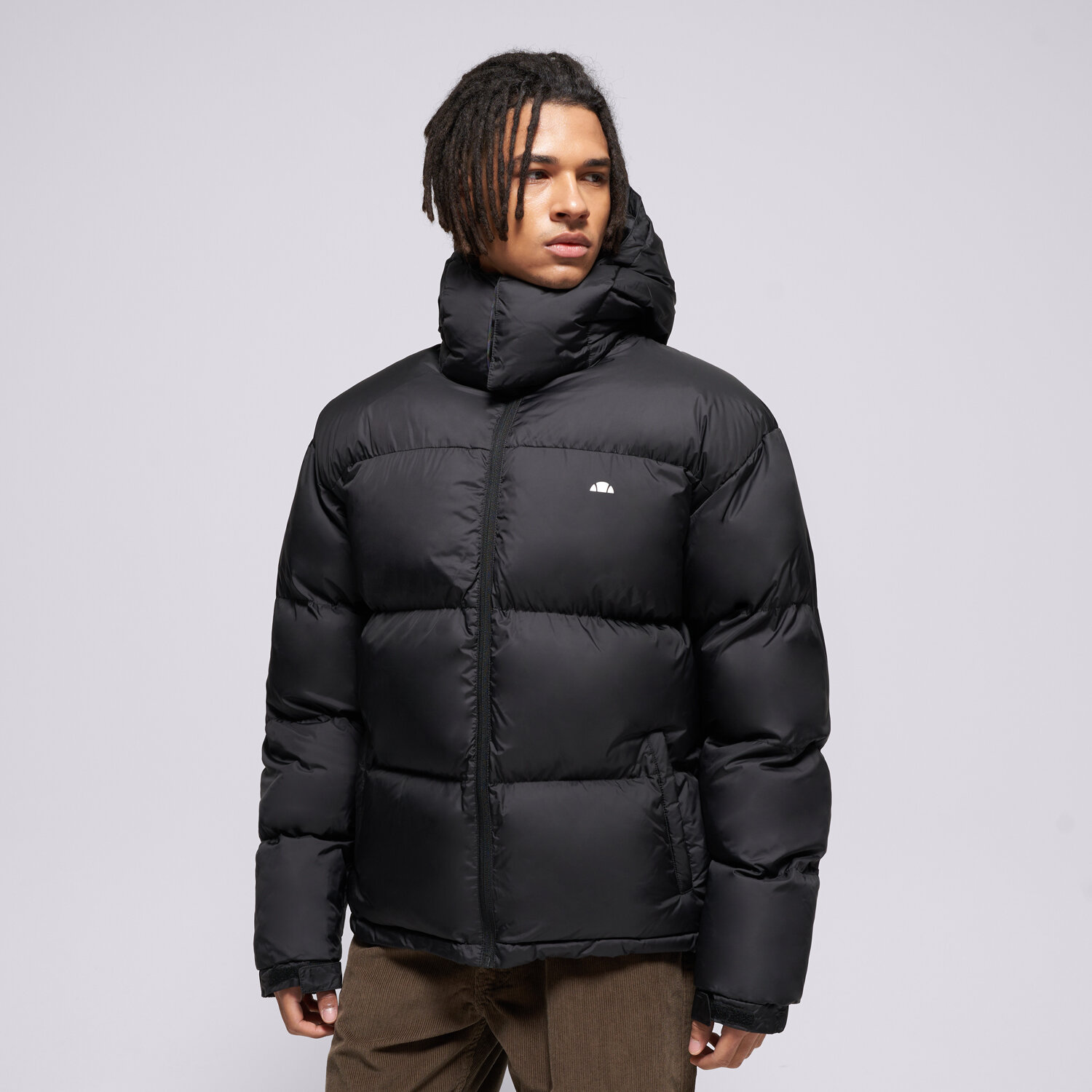 Herren Winterjacke ELLESSE DAUNENJACKE DOMINICIS PADDED BLK JACKET SHB23617015 Schwarz