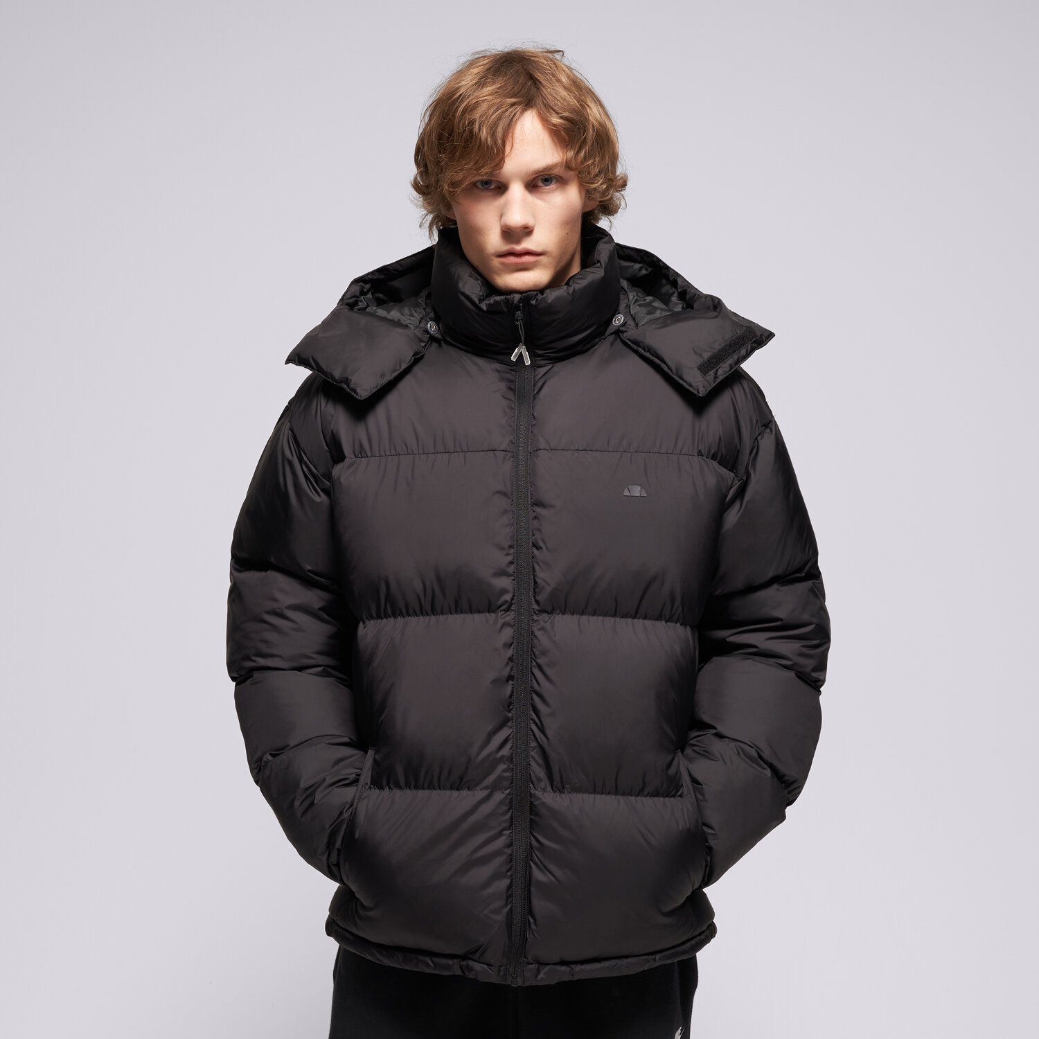 Herren Winterjacke ELLESSE DAUNENJACKE DOMINICIS PADDED BLK JACKET SHB23617015 Schwarz