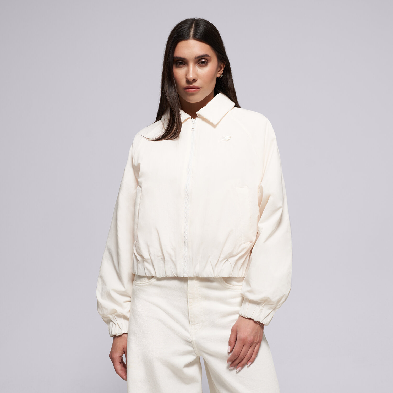 Damen Übergangsjacke NEW BALANCE JACKE WOVEN BOMBER JACKET WJ61D8YXSST Beige