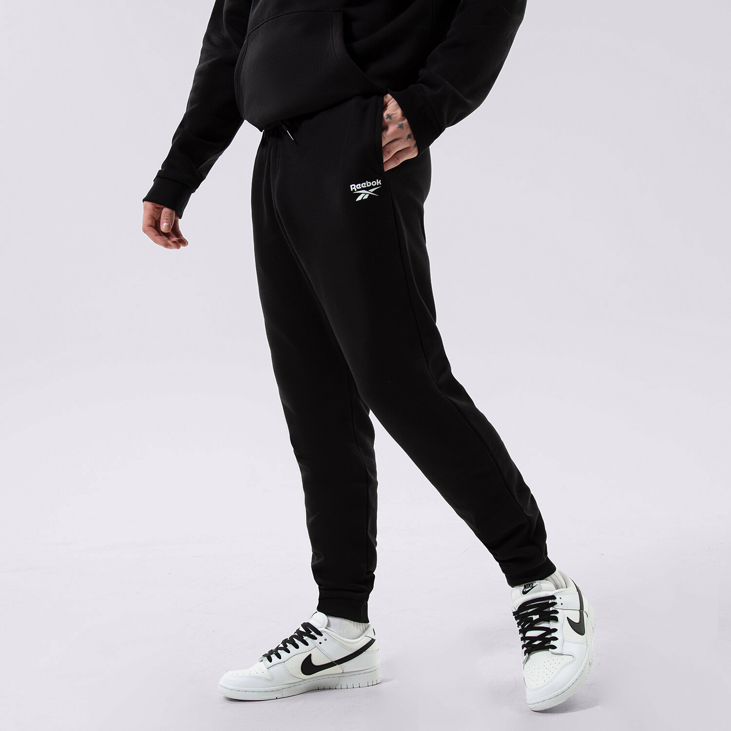 Herren Hosen REEBOK HOSE RI LEFT LEG JOGGER 100055296 Schwarz