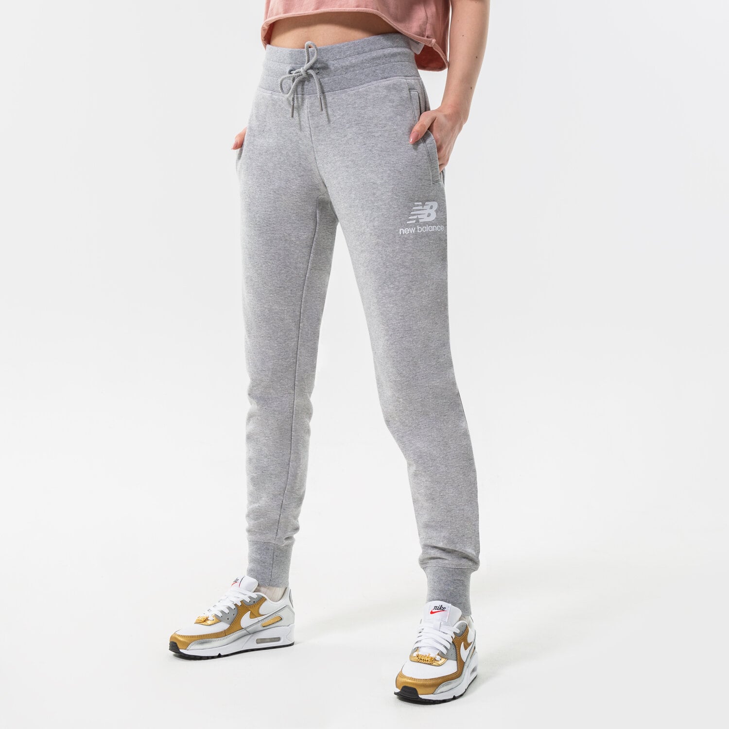 Damen Hosen NEW BALANCE HOSE NB ESSENTIALS FRENCH TERRY SWEATPANT WP03530AG Grau