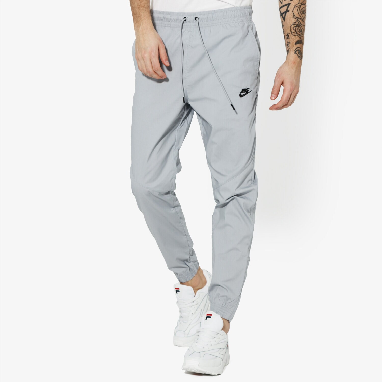 Herren Hosen NIKE HOSE M NSW PANT WR STREET SPORTSWEAR AR2368-012 Grau