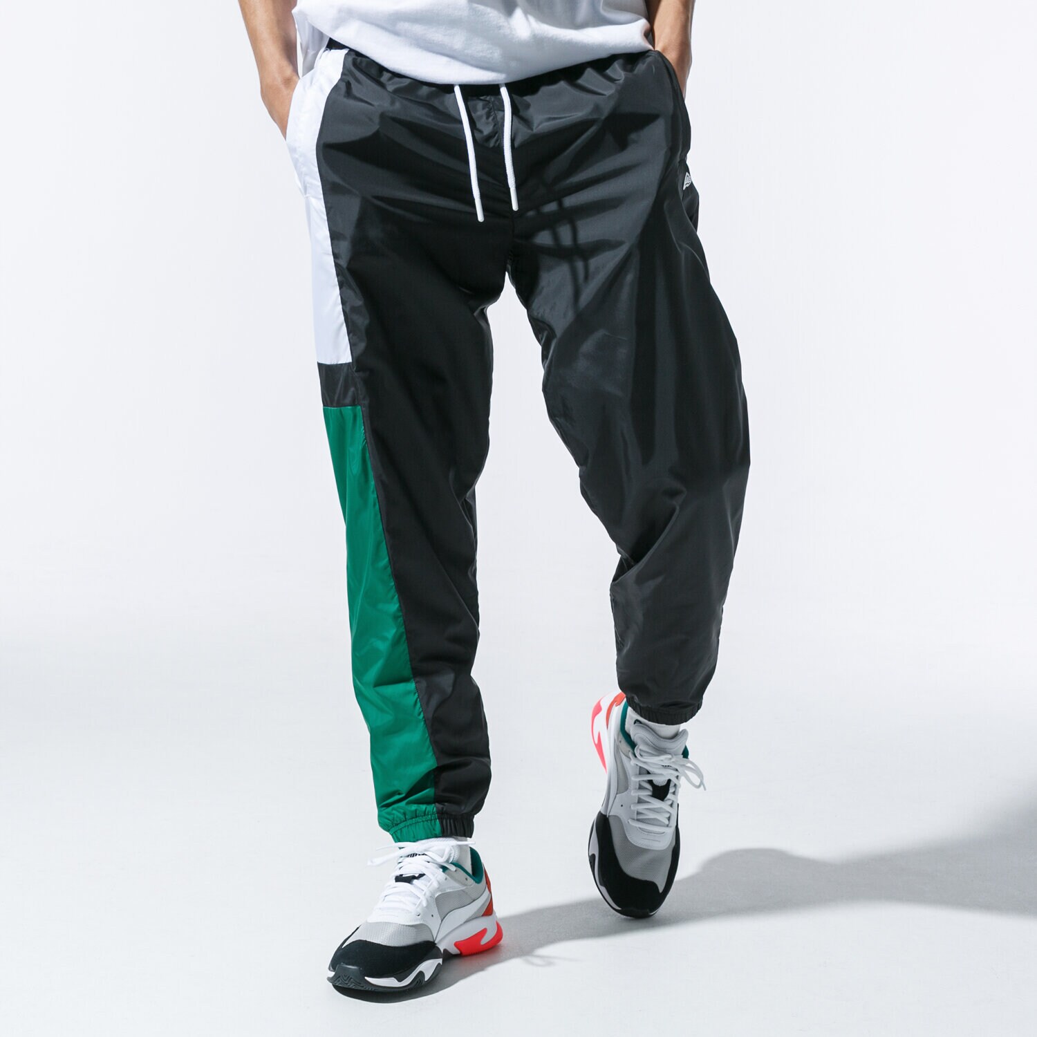 Herren Hosen NEW ERA HOSE COLOUR TRACK PANT BLKGRN NEW ERA BLKTRPWHI 12123955 Schwarz