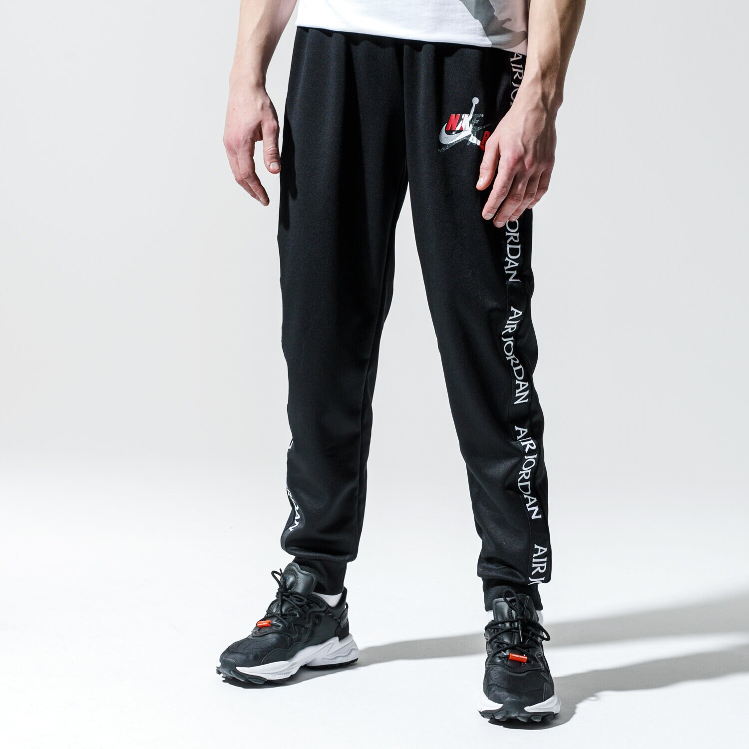 Herren Hosen JORDAN HOSE M J JM CLSCS TRICOT WRMP PANT CT9373-010 Schwarz