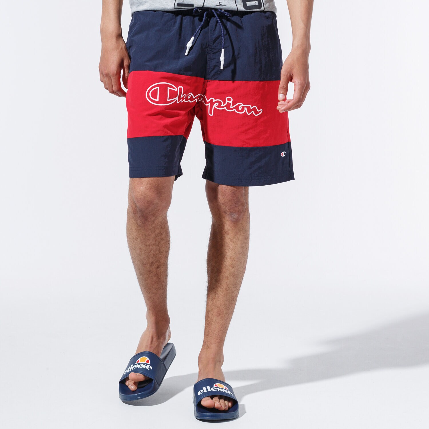 Herren Shorts CHAMPION SHORTS LOGO SWIM SHORTS 215499BS501 Dunkelblau