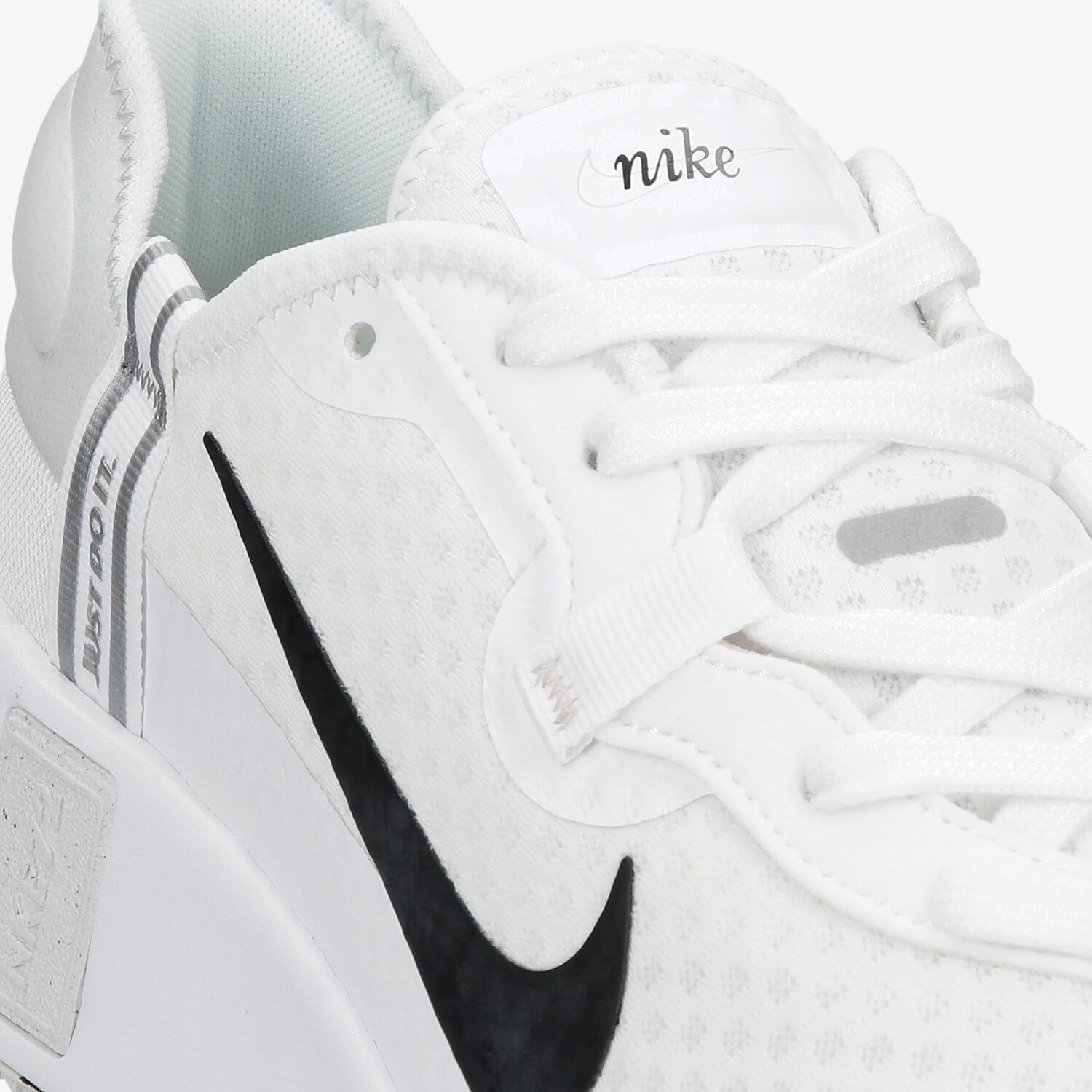 nike reposto sneakers in white