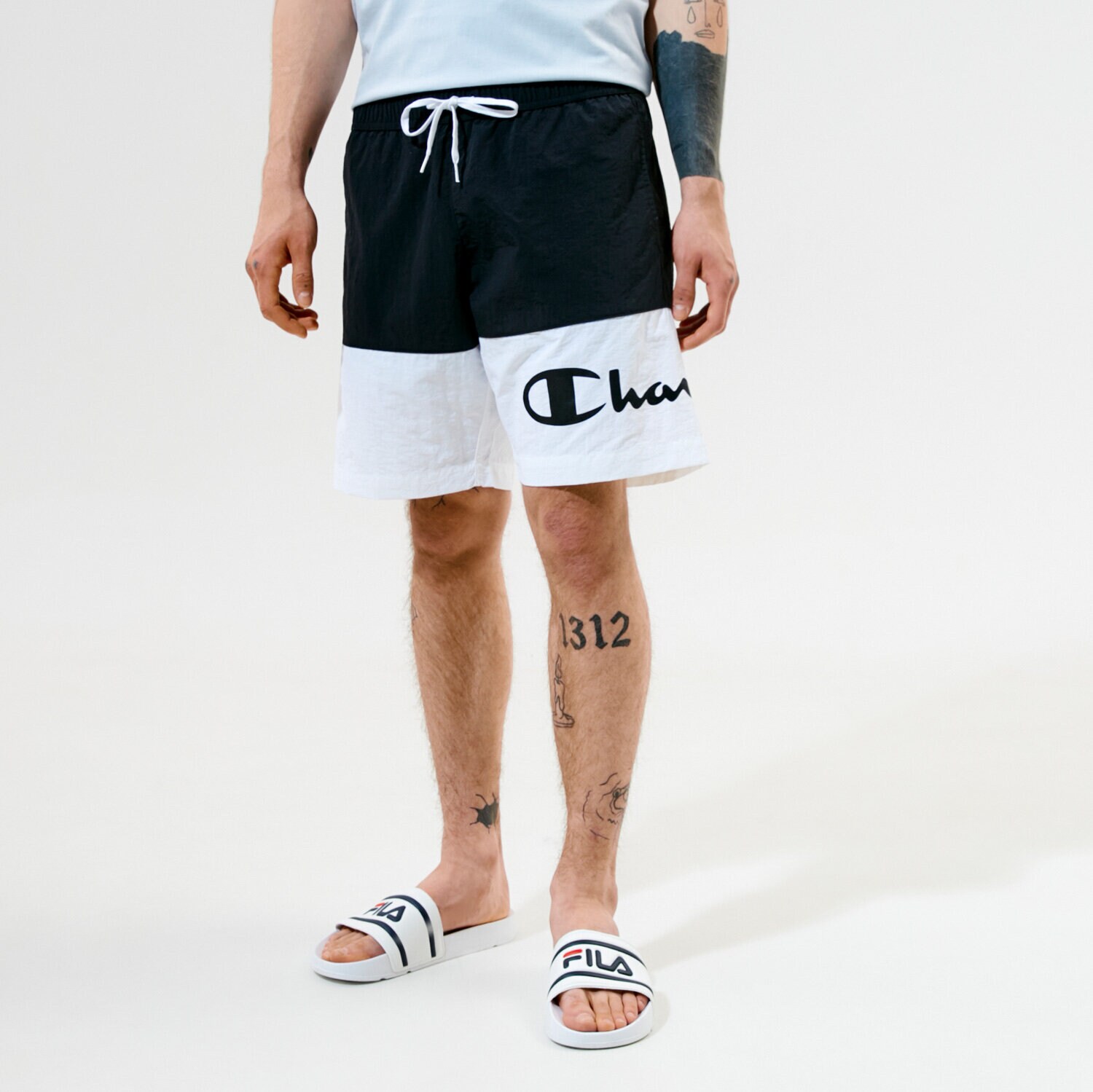 Herren Shorts CHAMPION SHORTS BEACHSHORT 216070KK001 Schwarz