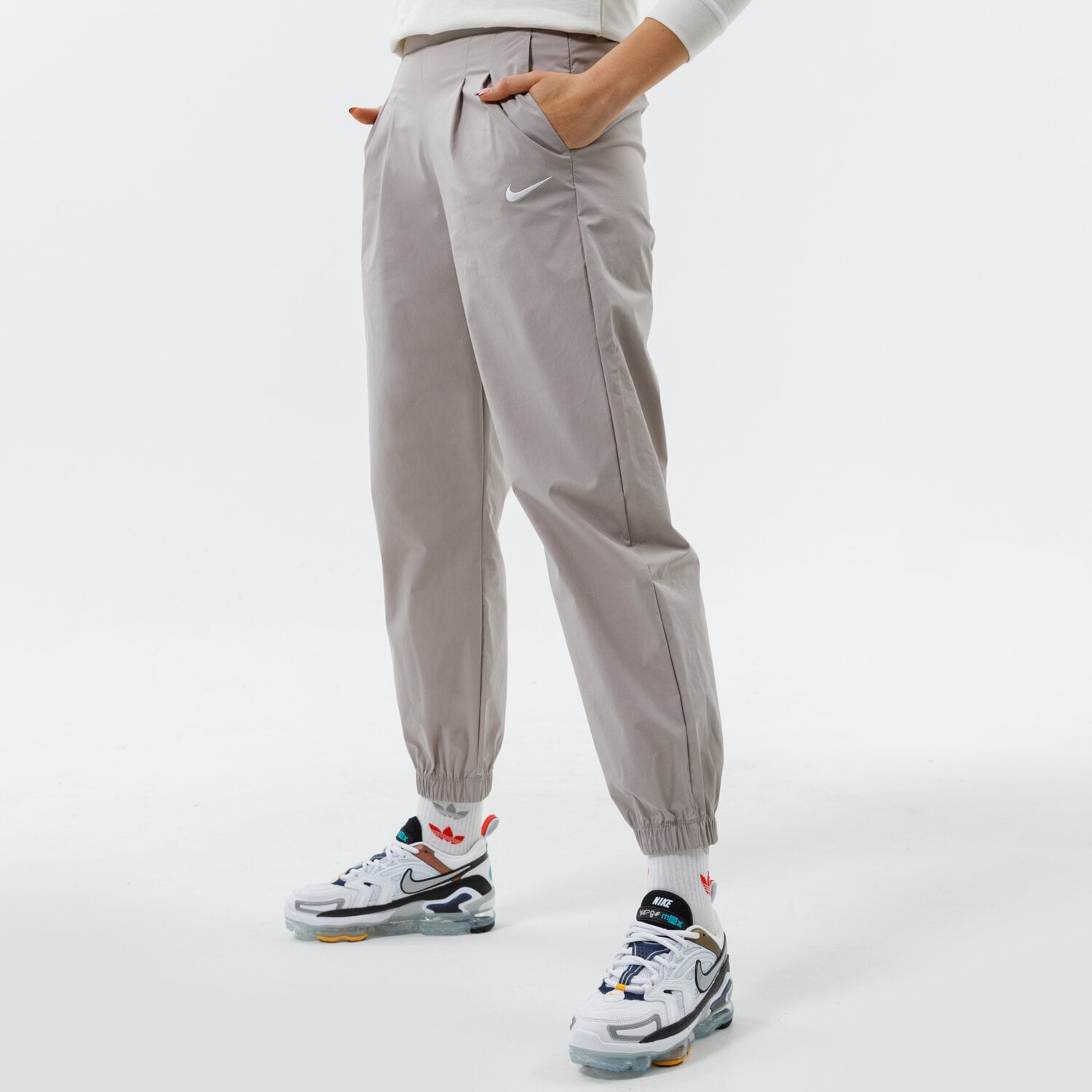 Damen Hosen NIKE HOSE W NSW ICN CLSH WVN HR JGGR DD5048-033 Grau
