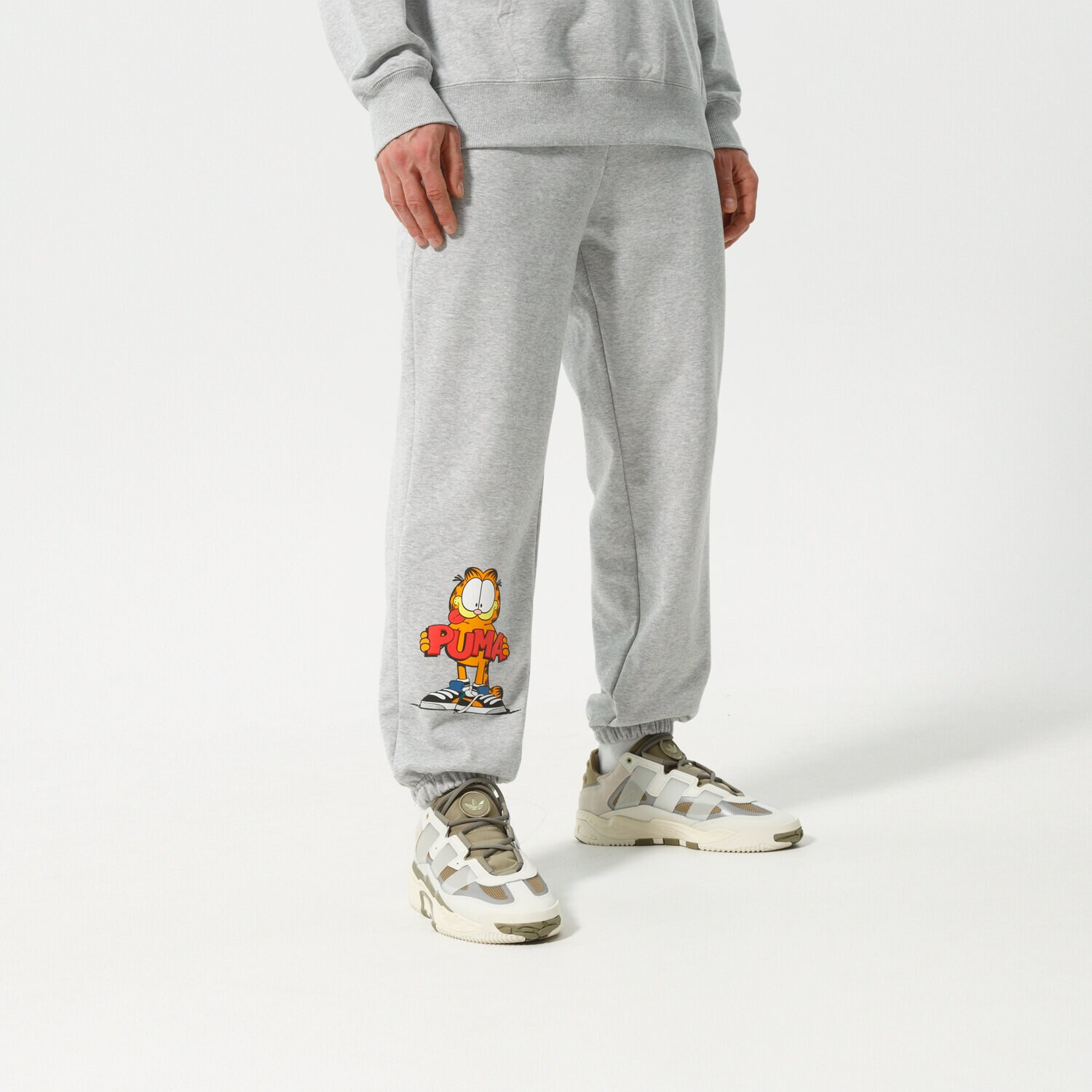 Herren Hosen PUMA HOSE PUMA X GARFIELD SWEATPANTS 534436 04 Grau