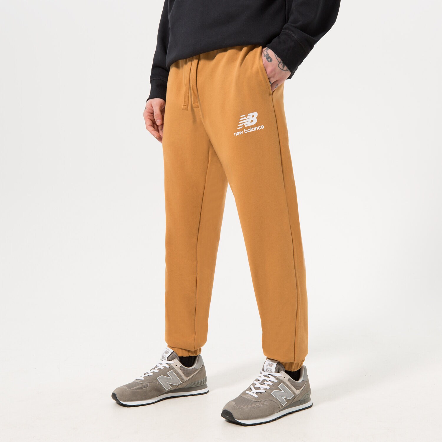 Herren Hosen NEW BALANCE HOSE NB ESSENTIAL STACKED MP31539TOB Braun