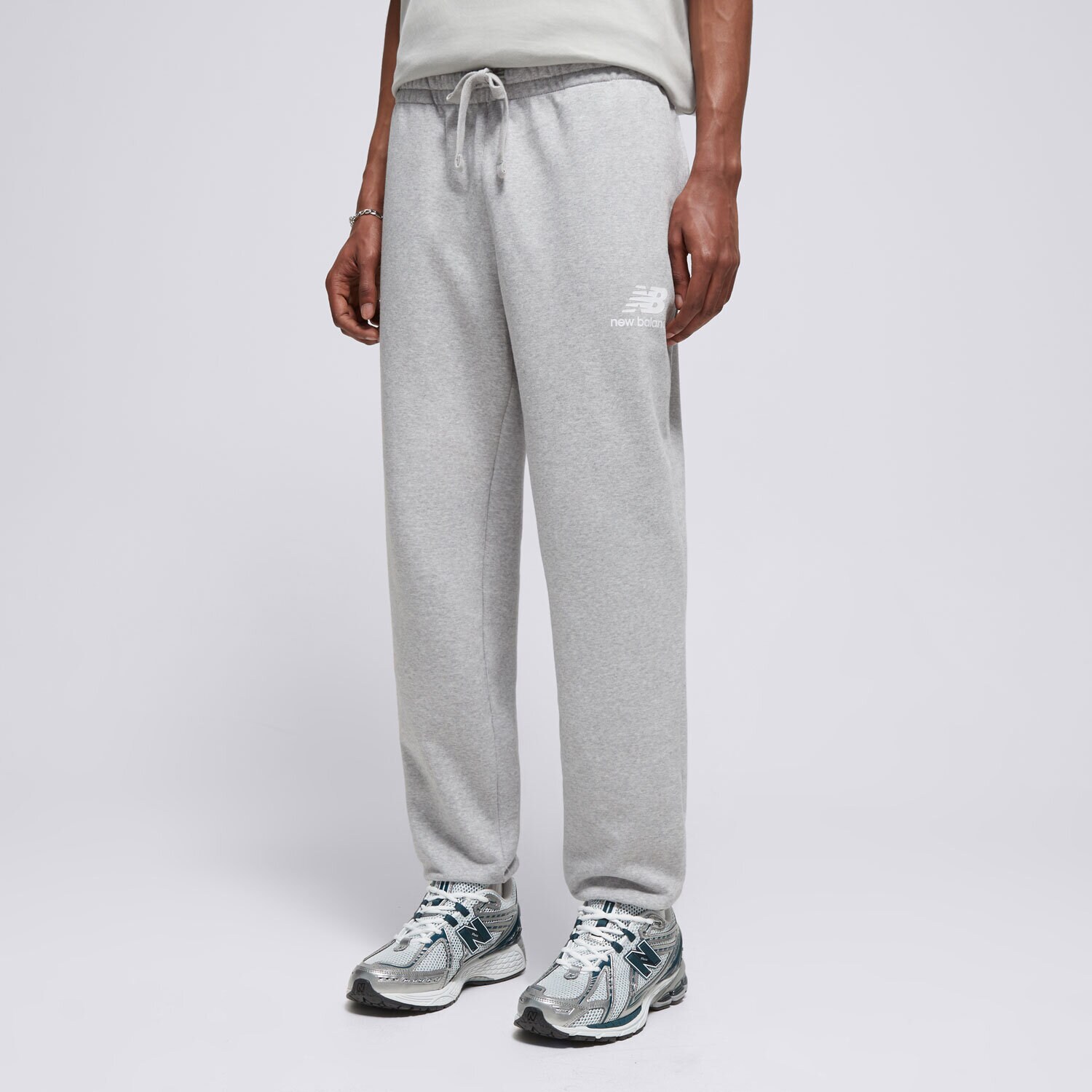 Herren Hosen NEW BALANCE HOSE NB ESSENTIAL STACKED MP31539AG Grau