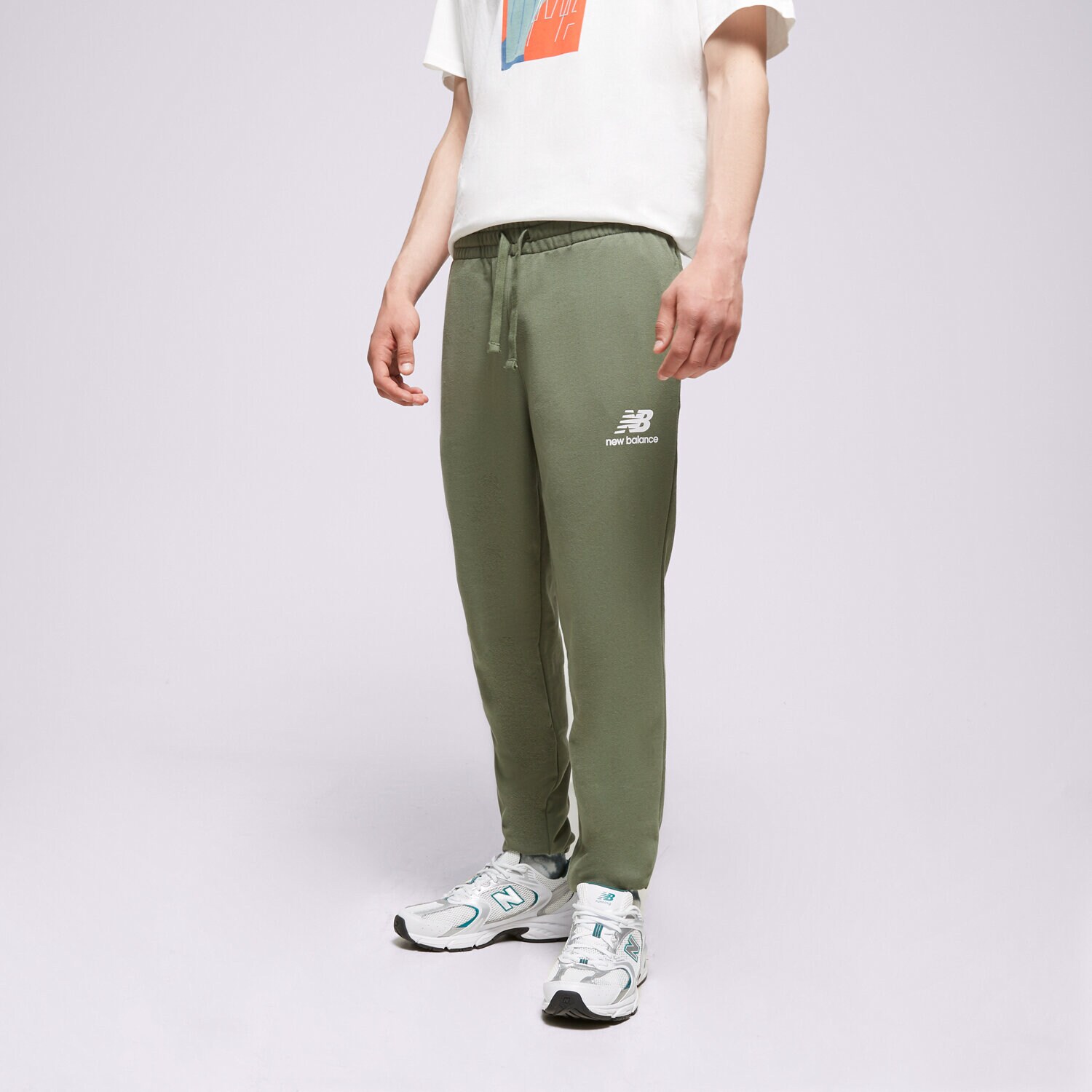 Herren Hosen NEW BALANCE HOSE ESSENTIALS STACKED LOGO MP31539DON Grün