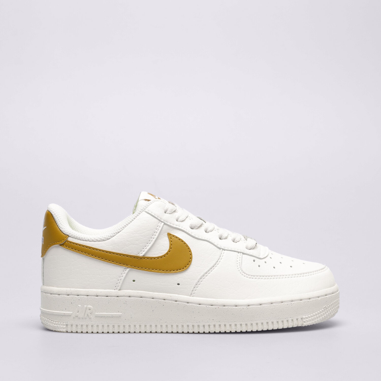 White and gold nike air force top